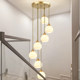 All-Copper Staircase Chandelier for Duplex Villa, Open-Air Living Room, Vertical Hollow American Minimalist French Cream Lighting Fixtures