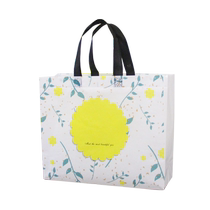 Spot thickening new clothing bag yellow flower non-woven bag custom handbag environmental protection bag custom logo gift bag
