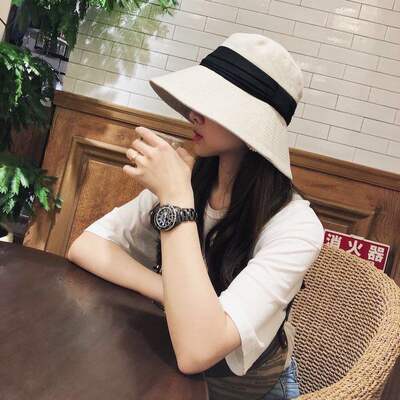 A Japanese-style cotton and linen sun hat for women, a foldable basin hat for summer outings, a casual and fashionable wide-brimmed sun hat