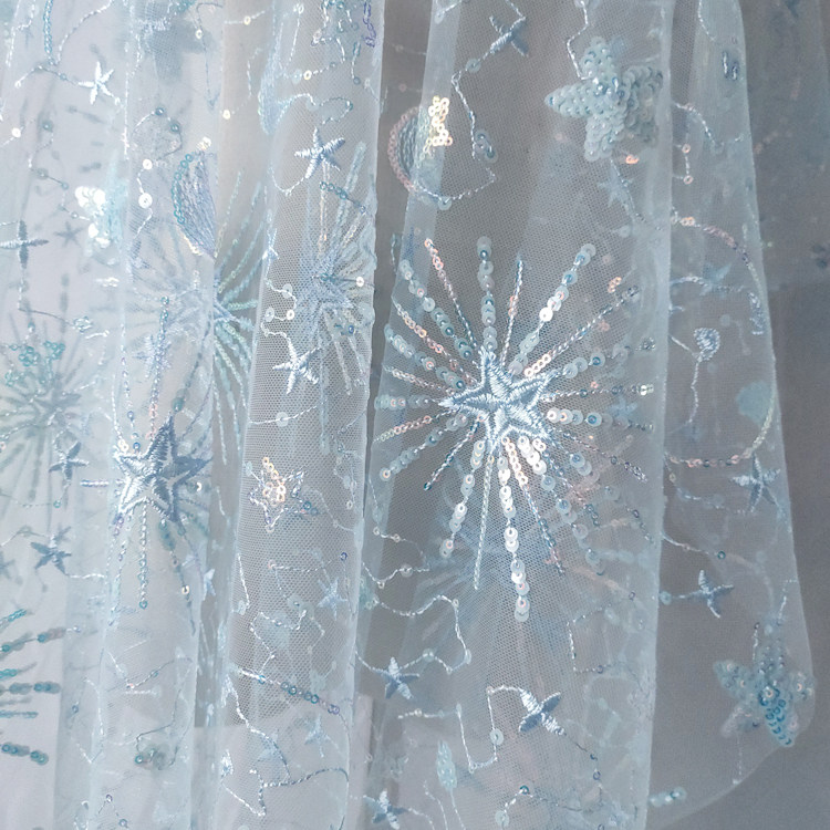 1meter Stars and moon sequined yarn cloth dress see-through sequined dress fashion designer mesh embroidery fabric