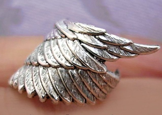 American's Archangel hand made to make its wings playful, pure silver ear clip ear cuff