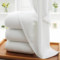 Xinjiang Holding Paper Edge Pure Cotton Hotel hotel Cosmetic Yard White Bath Towels Thickened water absorbent softness into NPC towels
