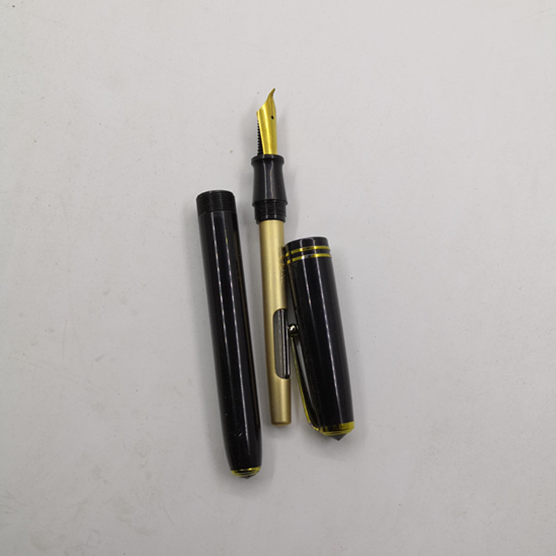 Ручка перьевая 老库存黑龙江28美工钢笔黄尖拧帽经典老钢笔1991年产品一支的价格