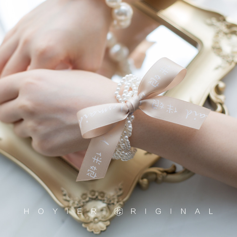 Flower is also a new wedding simple and elegant simple wedding bride pearl bracelet wrist flower bridesmaid bracelet