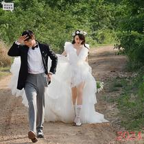 (Bai Xiaoxian) 2024 new forest style travel photography light wedding dress small super fairy short front and long back detachable tail