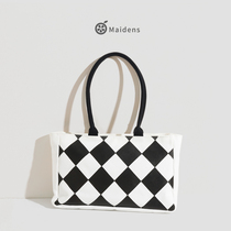 Orange Teenage Girl Black & White Chessboard Lattice Single Shoulder Bag 2022 New Korean version Handsails Bubpack Small crowdsourced large-capacity womens bag