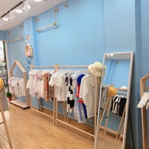 Childrens clothing store display rack shelf floor hanger solid wood Nordic decoration design renderings clothing store display rack