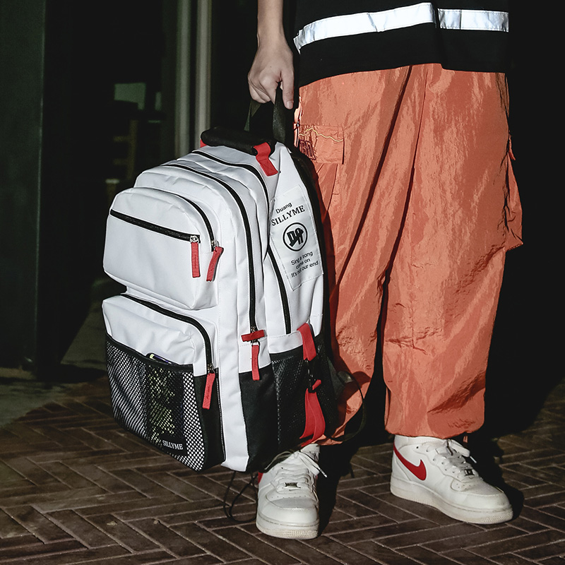 Large-capacity schoolbag female high school college student fashion trend backpack chic Harajuku Korean version travel backpack male