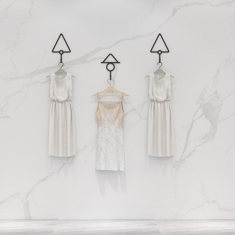 Clothing store display frame on walls hanging on female clothing store wall hanging on the wall of children's clothing hook