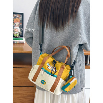 Retro contrasting color tie-mouth handbag student casual lightweight mobile phone bag women's niche design mini crossbody bag
