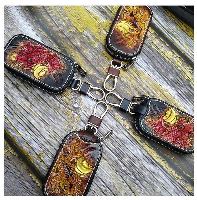 Handmade chạm khắc chìa khóa đầu lớp da bò dây kéo chống mất xe chìa khóa túi nam và nữ retro Tang cỏ khắc - Trường hợp chính túi đựng chìa khóa
