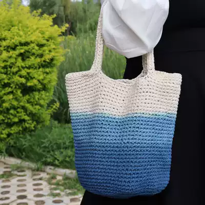 Lan dyesen women's one-shoulder hand bucket handmade woven bag female crossbody travel holiday leisure Korean straw bag