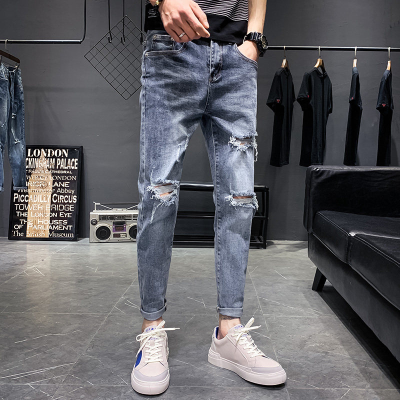 2021 new spring and autumn ripped nine-point denim pants men's Korean version of the trendy slim feet pants all-match leggings pants