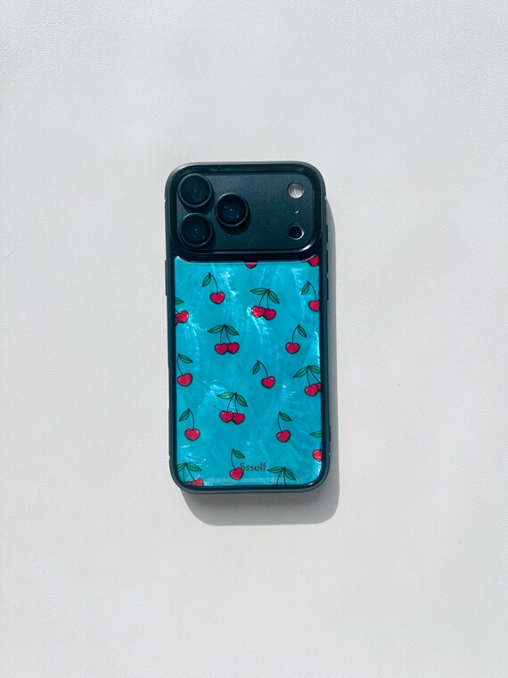 Juicy Cherries Turquoise Shimmer iPhone Case