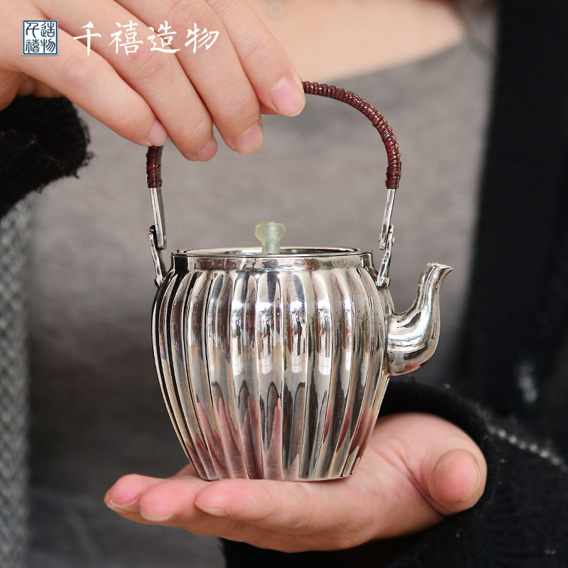 Silver pot 999 sterling silver bubble teapot foot silver handmade melon petal retro Japanese kung fu home boiling water lift beam small pot