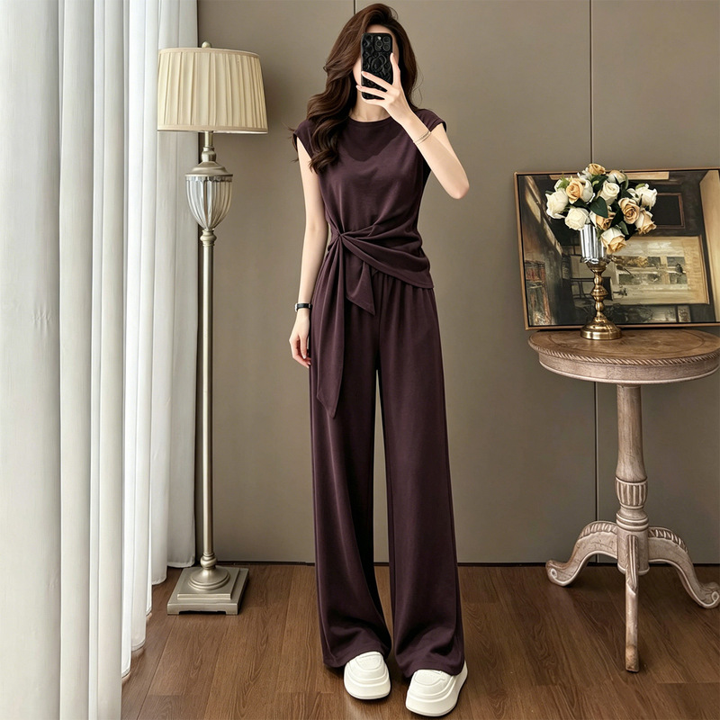 High-End, Stylish, Casual Sports Suit for Women, Summer 2026 New Style, Slimming Irregular Top and Wide-Leg Pants Two-Piece Set High-End, Stylish, Casual Sports Suit for Women, Summer 2026 New Style, Slimming Irregular Top and Wide-Leg Pants Two-Piece Set