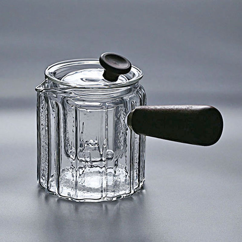 Heat resistant glass pot tea brewing tea small green mandarin flower tea Pu'er tea Pu'er small health preserving pot black crystal stove boiling tea side to make pot