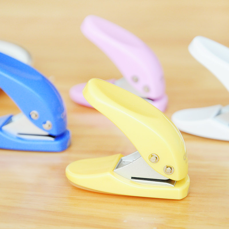Three years two classes●Deli binding stationery Cute candy color paper punch machine Mini manual single hole punch