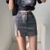 YoungGirlDay Phong cách Âu Mỹ cạp cao gợi cảm xẻ tà đơn phương túi chống chói hông váy denim váy ngắn - Váy