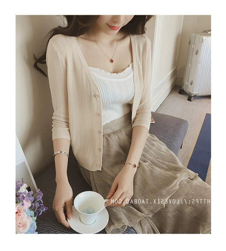 Mùa hè áo len lụa cổ chữ V của phụ nữ áo len ngắn đoạn mỏng tay áo bảy điểm điều hòa áo sơ mi mỏng phần áo chống nắng áo choàng