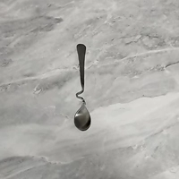 Серебряная изогнутая ложка 12,5см.