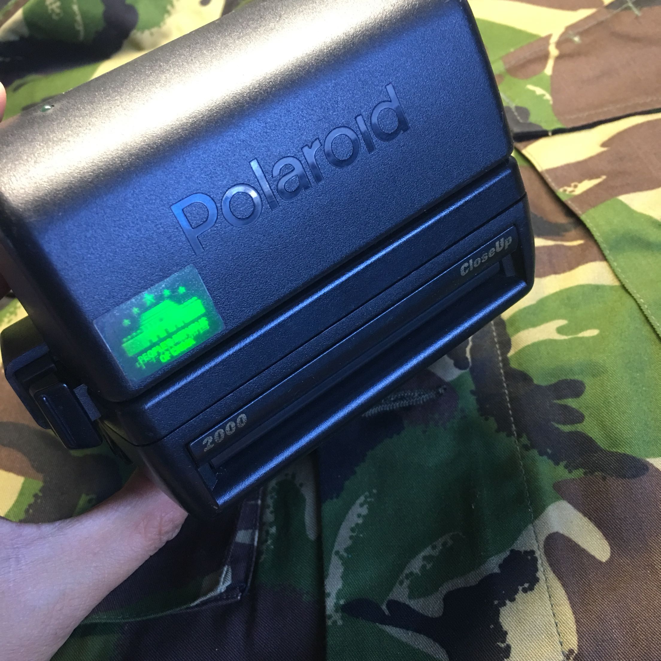 Polaroid's new 2000 Polaroid camera is in good condition and functions normally and is ready to use. Storage number 765