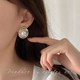 Light luxury high-end sense of pearl flash diamond earrings women Korean net red temperament celebrity earrings niche design unique earrings