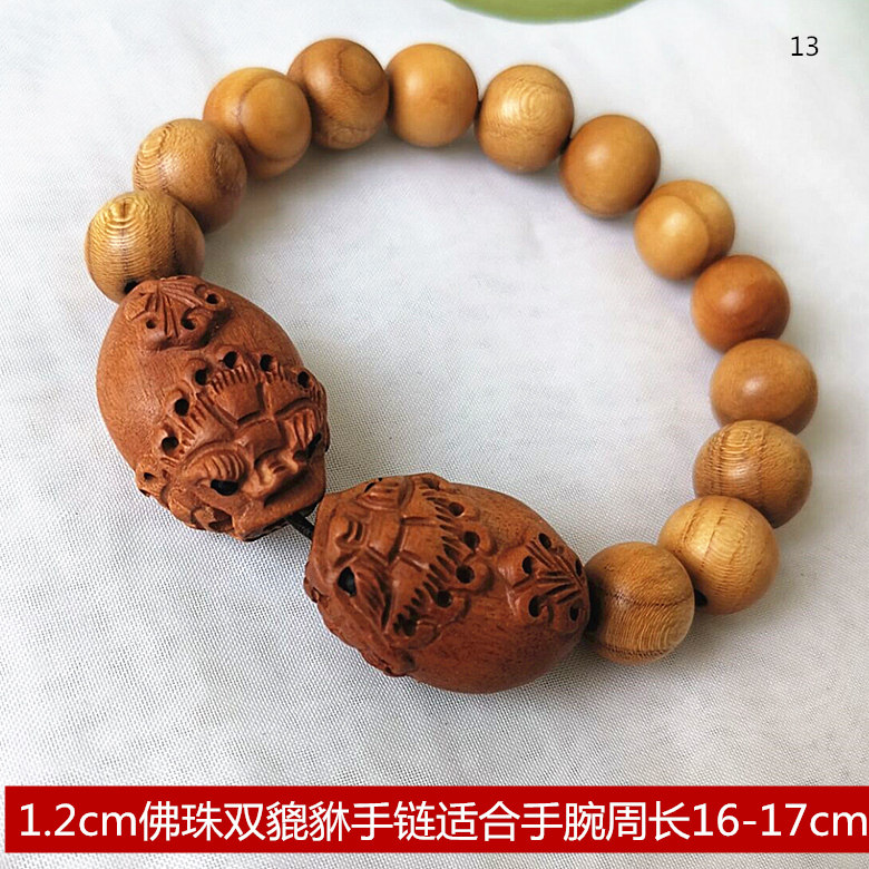 Peach wood leopard Buddha Pearl hand Alchemy Hand Strings of Hand Strings Wood Carving Leopard Leopard for men and women Artisan Crafts Gift Hem Ornaments