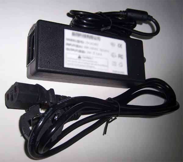 The Roland Roland FA-101 audio connector power supply adapter