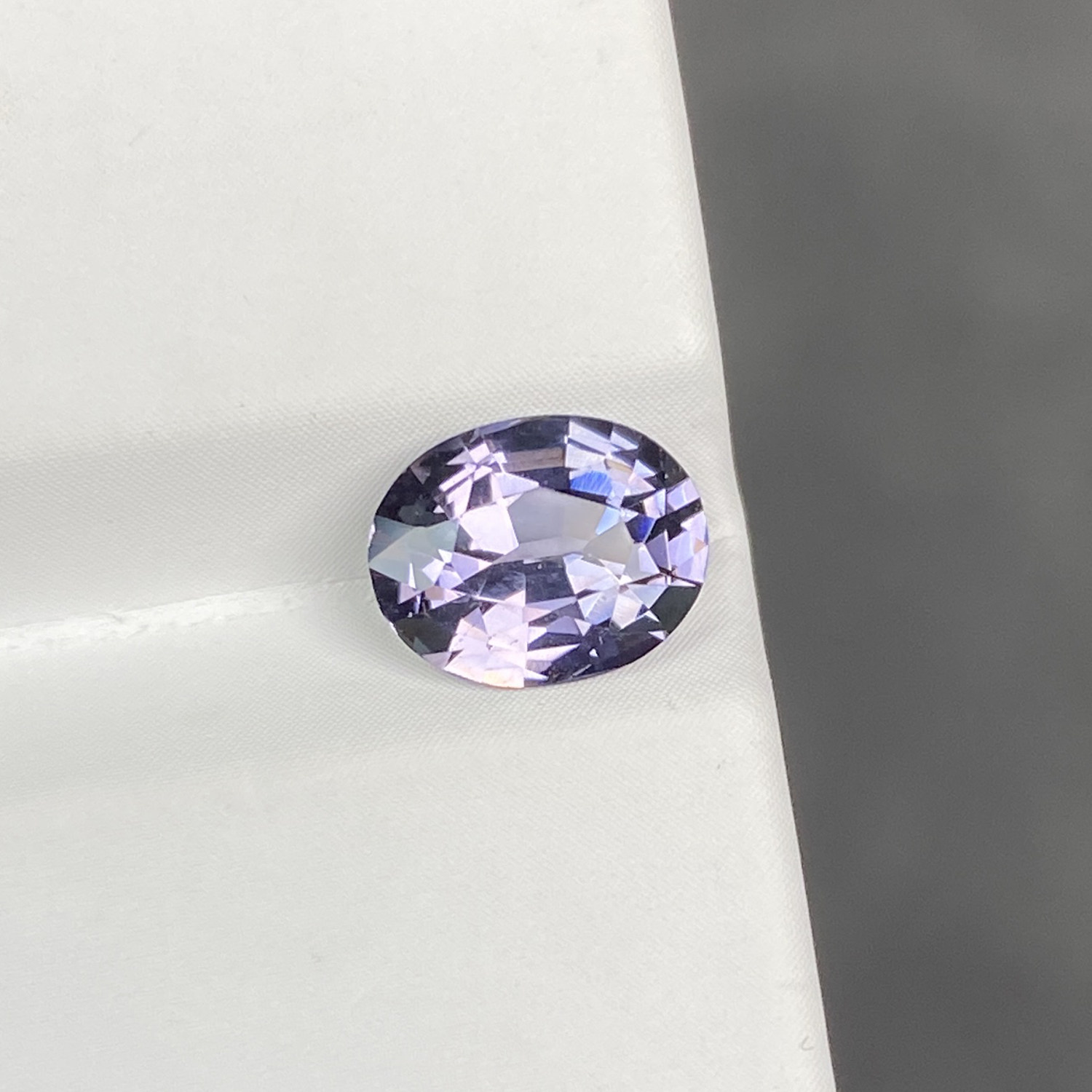 1.6 carat natural metallic purple spinel oval