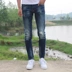 Thẻ nam thân hình ở eo thấp chân nhỏ quần jeans lỗ khoét quần dài xu hướng trẻ trung 2019 - Quần jean quần ống suông nam Quần jean