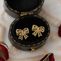 Hollowed-out butterfly knot earring earrings woman s925 pure silver needle retro style temperament small crowdsourced design High level sensual nail