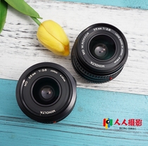 MINOLTA SLR camera with MINOLTA MD 35 1 8 35 2 8 35mm f1 8 F2 8