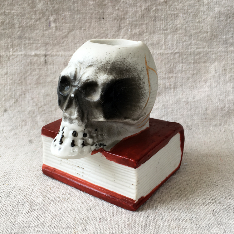 vintage 40 skull pottery candle holder
