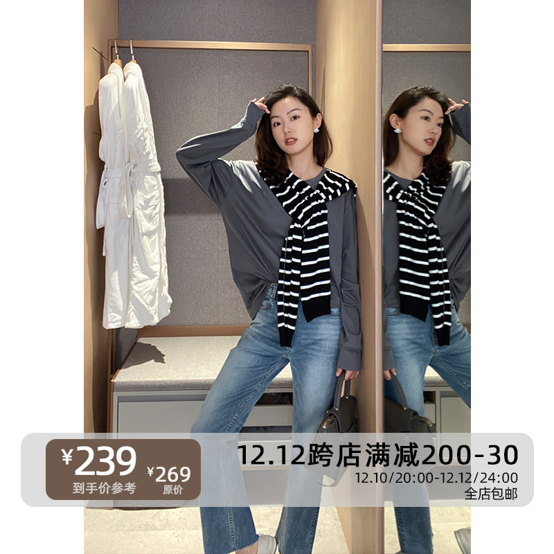 Mudge's shop is trendy out of the street. Retro raw-edged straight cropped jeans show long legs