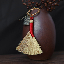 At the beginning of the art the golden broom baby protects the body and is shocked by the small broom. Fulu auspicious hand-woven key chain pendant mobile phone pendant