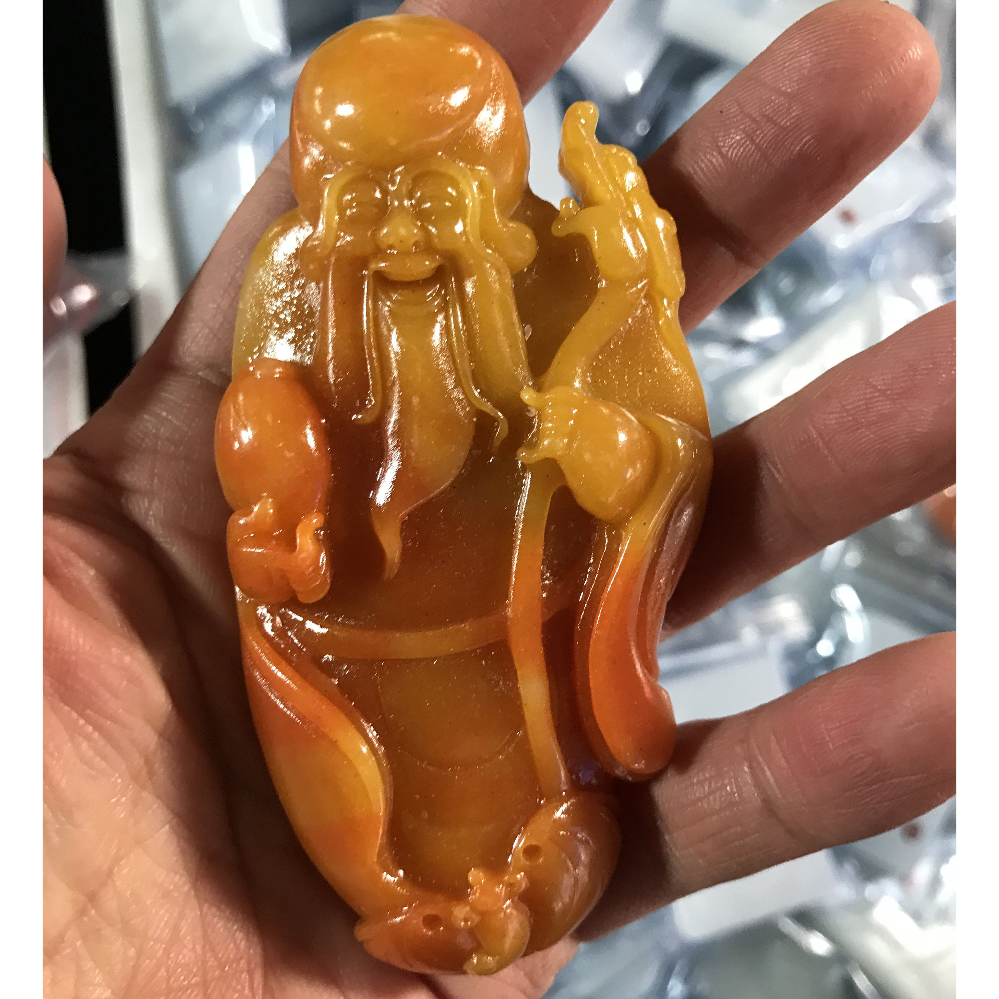 Yunnan Huanglong jade original stone shouxing handle piece imitation field topaz Fulu shou hand play piece gift men and women to play piece