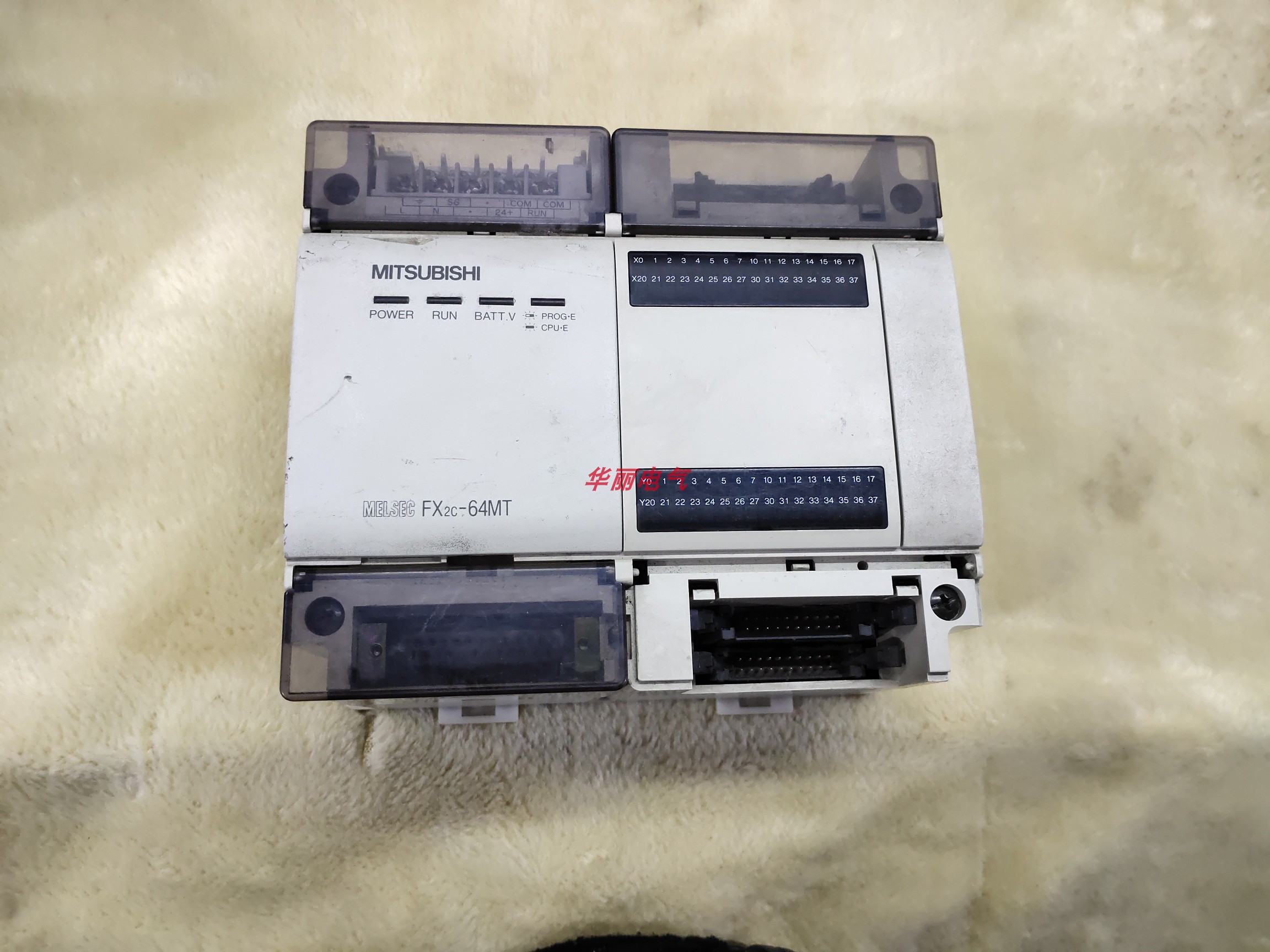Second hand original installed Mitsubishi PLC programmable design controller FX2C-64MT
