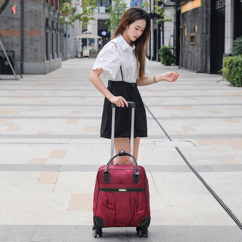 2022 New Short Travel Bag Large Capacity Waterproof Luggage Bag Oxford Cloth Universal Wheels Travel Boarding Laps