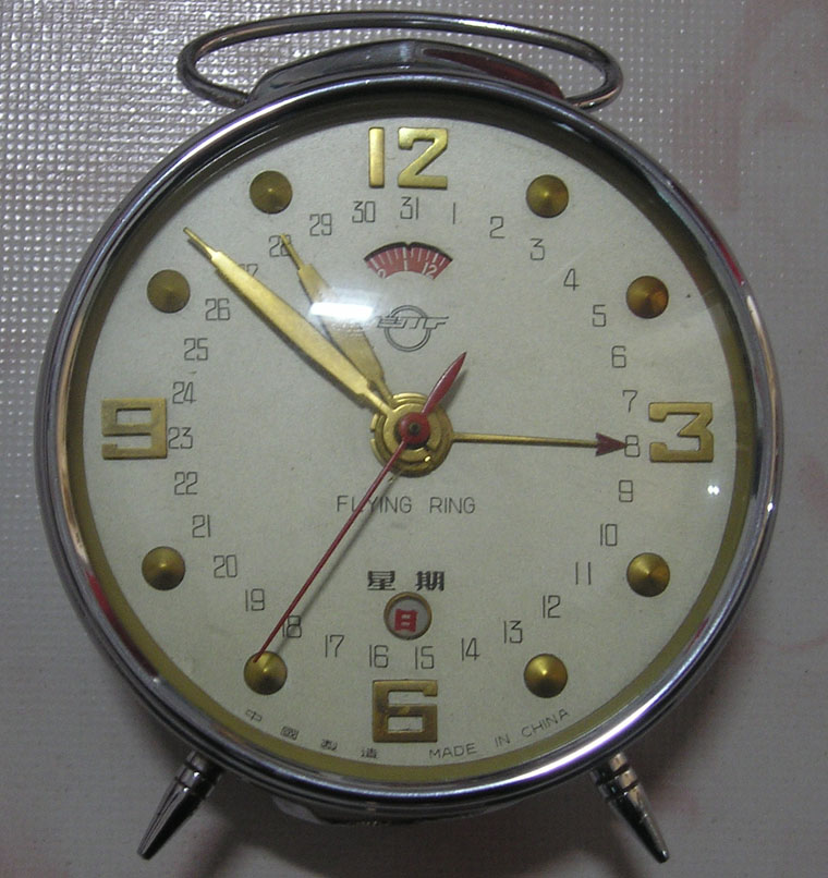Shanghai Antique Alarm Clock Hard To See Flying Rings Double Calendar Single Calendar Alarm Clock *** is about a look