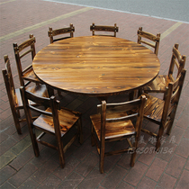  Retro black charcoal burning dining table and chair Classical all solid wood pine carbonized hot pot table and chair Hotel dining table dining chair Round table