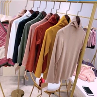 Mùa thu cô gái mới hoang dã mềm mại modal cotton nửa chiều cao cổ áo mỏng chạm đáy áo trẻ em áo thun dài tay ao thun be trai han quoc