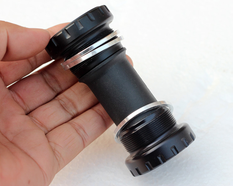 Bicycle central axis bb51 one-piece press-in central axis threaded left and right bowls