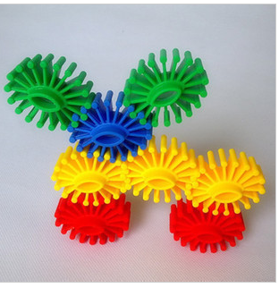 Run gears Flower ball plastic block toys Snow plug children's puzzle toys fun desktop toys