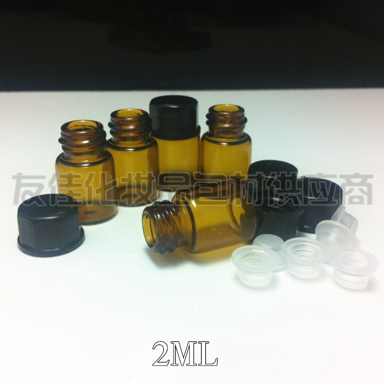 Factory direct sales 2ML brown essential oil bottle with plastic cap mini bottle sub-bottling glass bottle sample bottle
