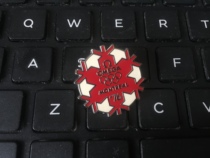 2010 Vancouver Winter Olympics badge Omega badge 1976 Montreal Olympics snowflake badge