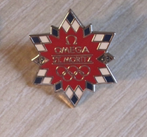 2010 Vancouver Winter Olympics badge Omega badge 1948 St. Moritz Winter Olympics snowflake badge in Switzerland