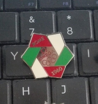 2010 Vancouver Winter Olympics badge Omega badge 1960 Italy Rome snowflake badge