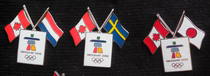 2010 Vancouver Winter Olympics badges double flag badges of participating countries Netherlands Japan Greece single