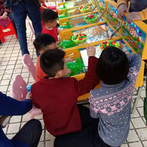 The new cannon cannon hits Zhewa Paradise temple Fair Square night Market stalls childrens marbles game machine first gold